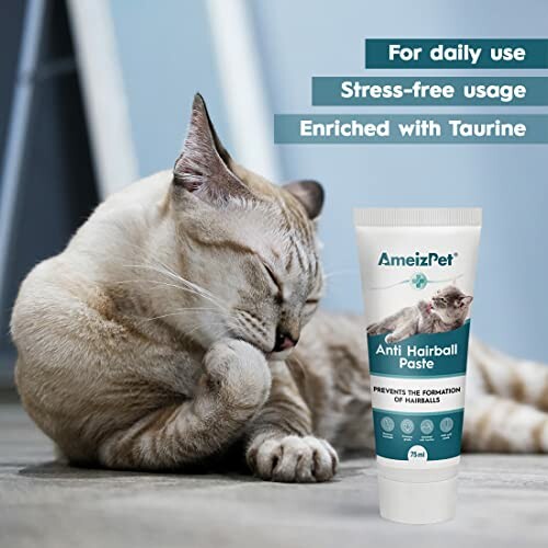 Cat grooming beside AmeizPet anti hairball paste.