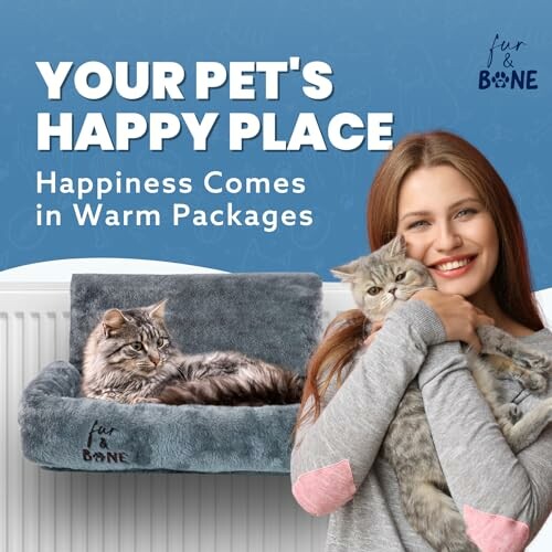 Woman holding a cat next to a cat on a cozy pet bed.